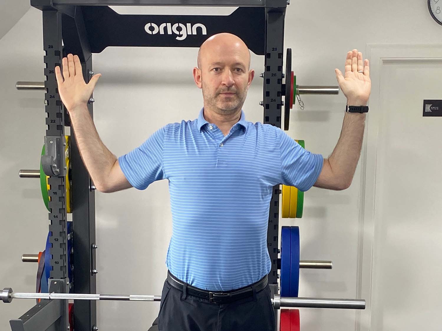 Wall slide exercise golf warm-up